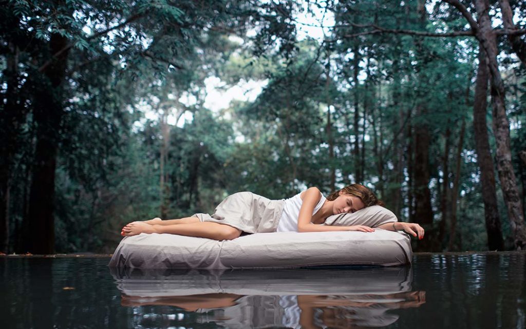 Person sleeping on a lake