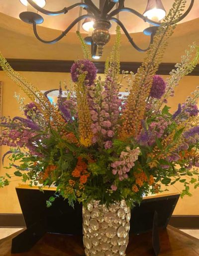 Flower arrangement in a silver vase